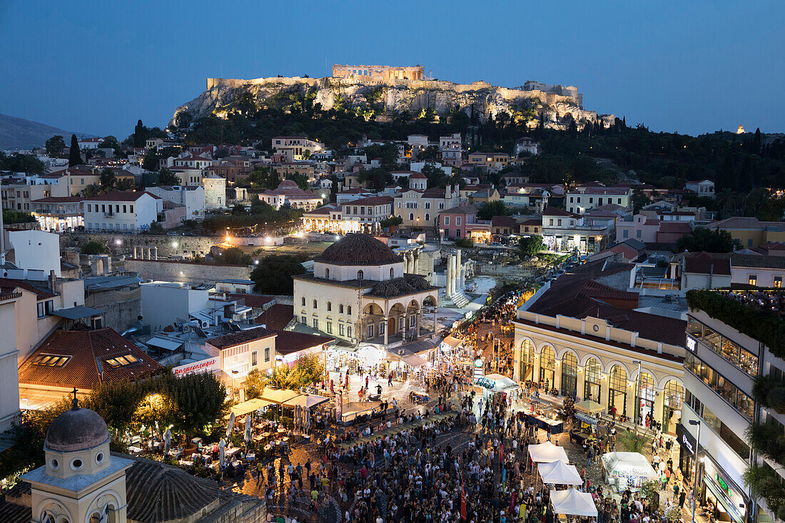 Monastiraki Square with music concert and the Acropolis from roof of A for Athens hotel at night, Monastiraki, Athens, Greece, Europe