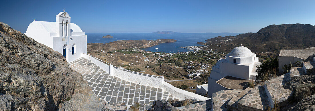 View of Livadi Bay and white Greek Orthodox churches from atop Pano Chora, Serifos, Cyclades, Aegean Sea, Greek Islands, Greece, Europe