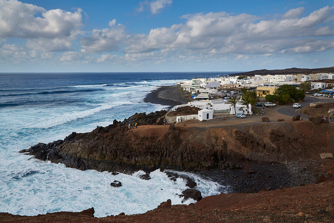 Rocky coast with the village of El Golfo, Atlantic Ocean, Lanzarote, Canary Islands, Islas Canarias, Spain, Europe