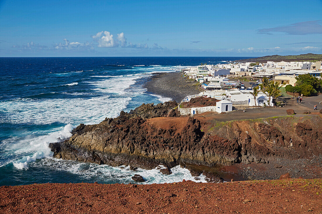 Rocky coast with the village of El Golfo, Atlantic Ocean, Lanzarote, Canary Islands, Islas Canarias, Spain, Europe