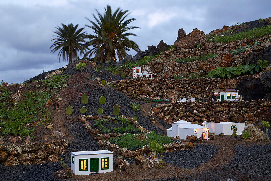 Illuminated open air nativity figurines in the town of Yaiza, Atlantic Ocean, Lanzarote, Canary Islands, Islas Canarias, Spain, Europe