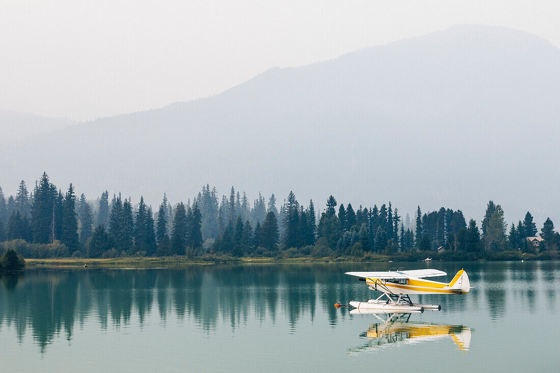 Float plane moored on Green Lake, Whistler, British Columbia, Canada