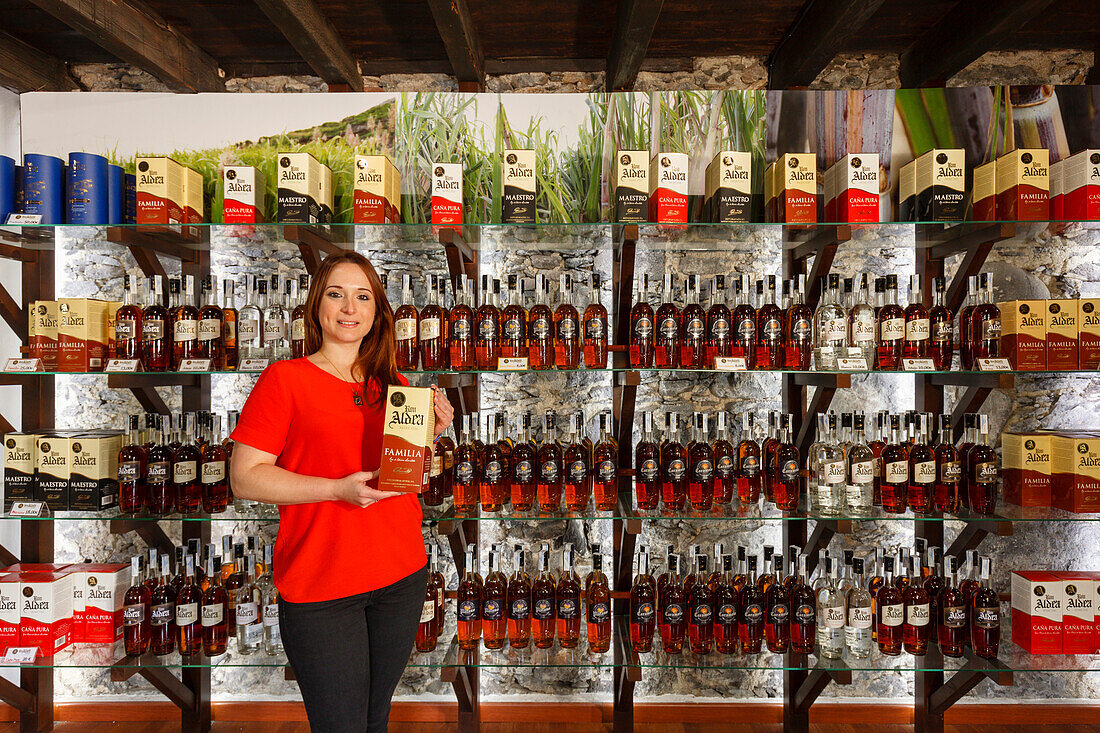 woman, shop, tasting room, rum factory of Ron Aldea, near Puerto Espindola, east coast, Atlantik, near San Andres, San Andres y Sauces, UNESCO Biosphere Reserve, La Palma, Canary Islands, Spain, Europe