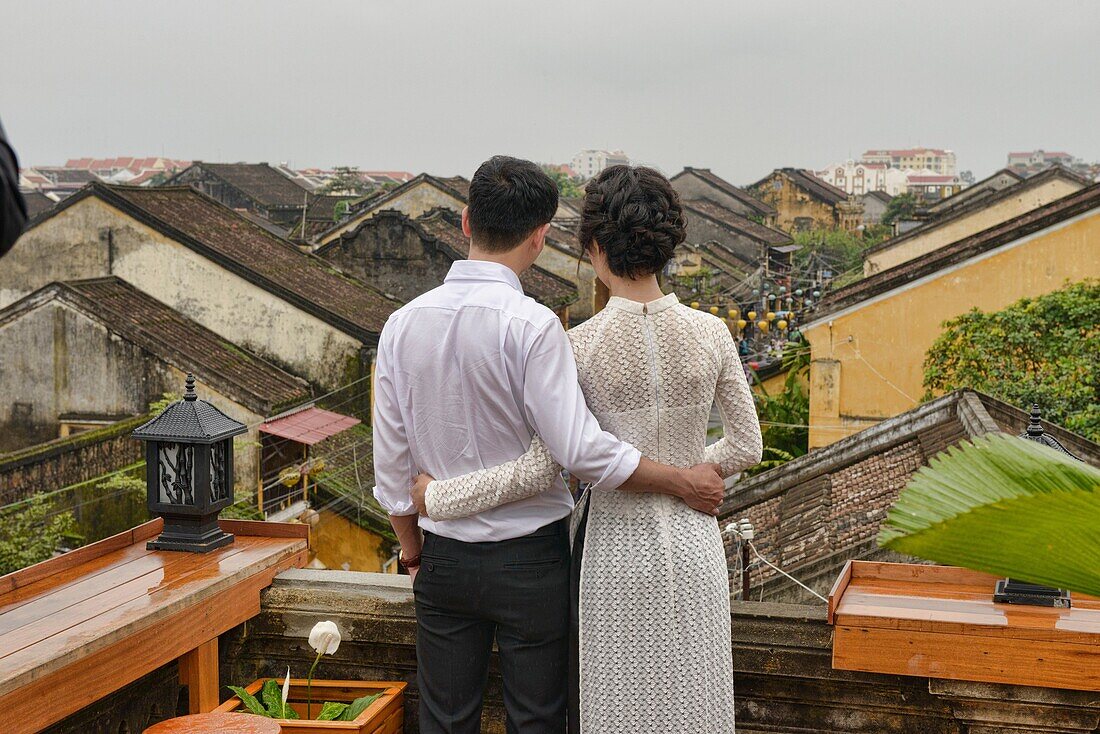 Love on the rooftop, historic old district, Hoi An, Vietnam.