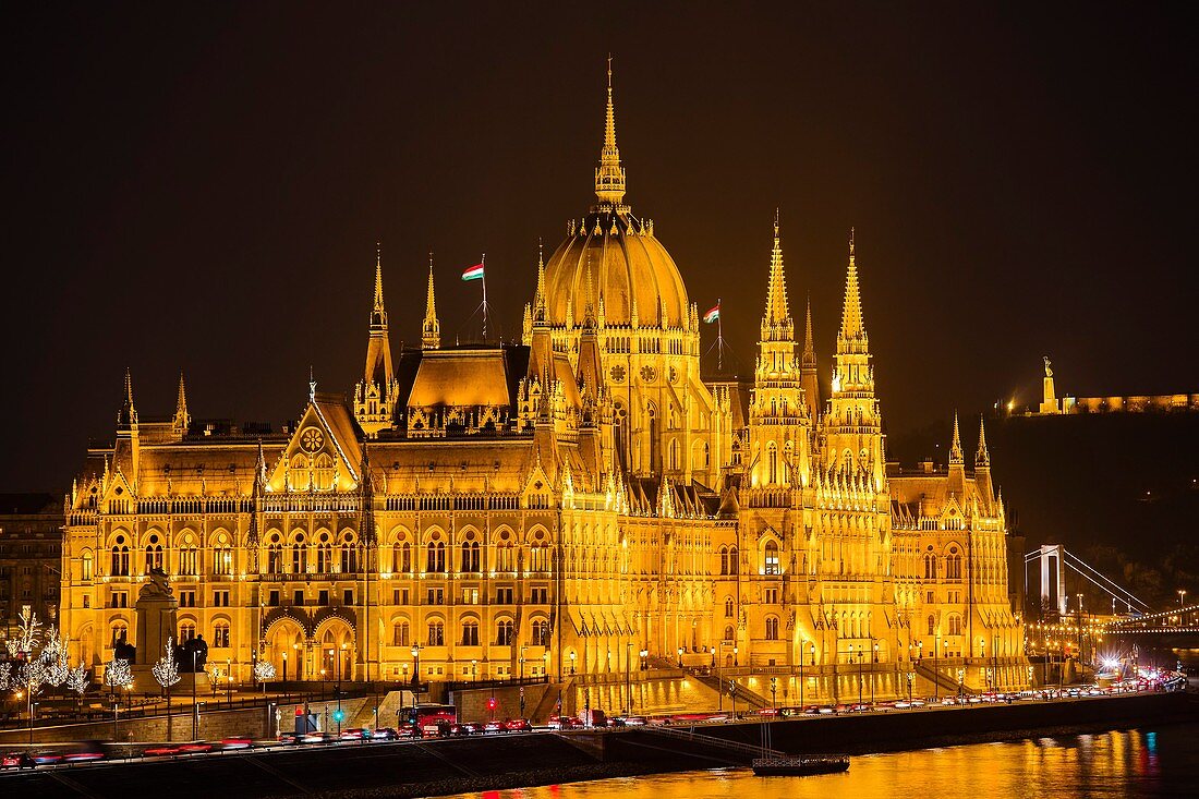 Hungarian Parlament building at night, Neogothic Style, National Assembly. Banks of Danube river. Budapest Hungary, Southeast Europe.
