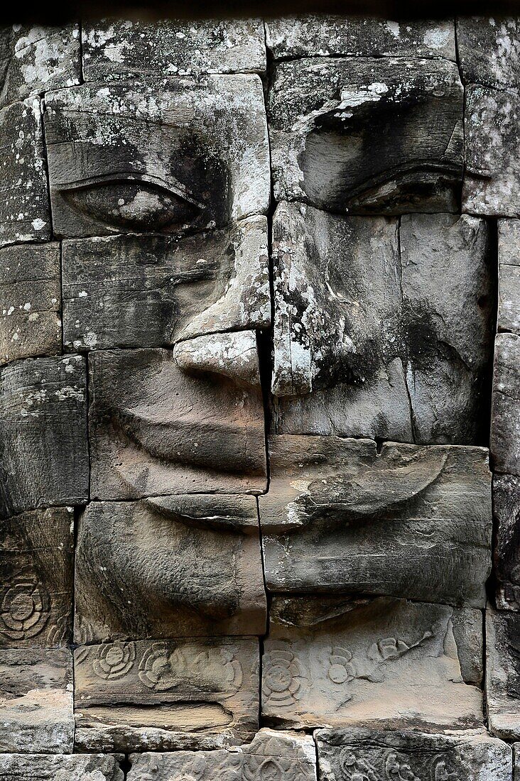Carved stone head at Bayon temple,Angkor Wat,Cambodia,Indochina,Southeast Asia,Asia.