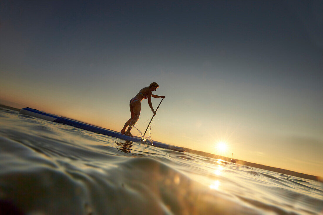 Stand Up Paddler on Lake Starnberg,  Lake Starnberg, Bavaria, Germany