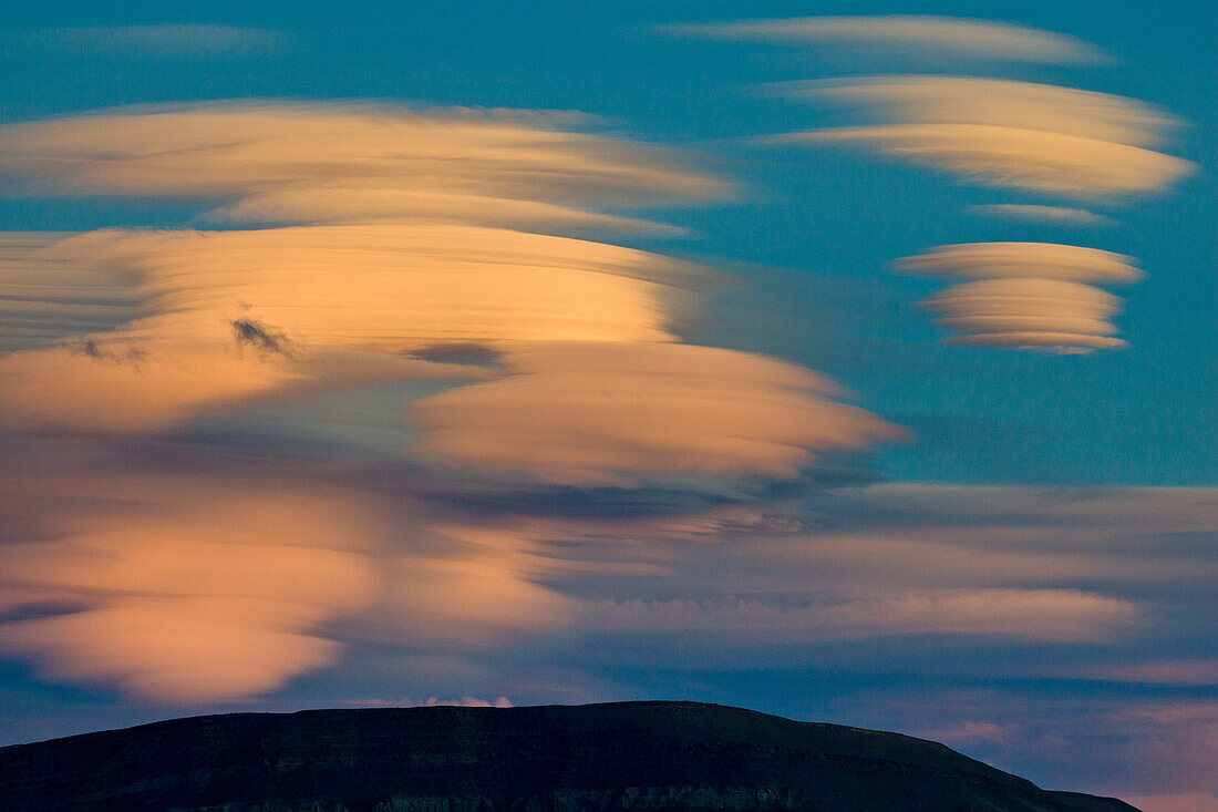 Lenticular clouds at sunset in spring, Patagonia, Argentina