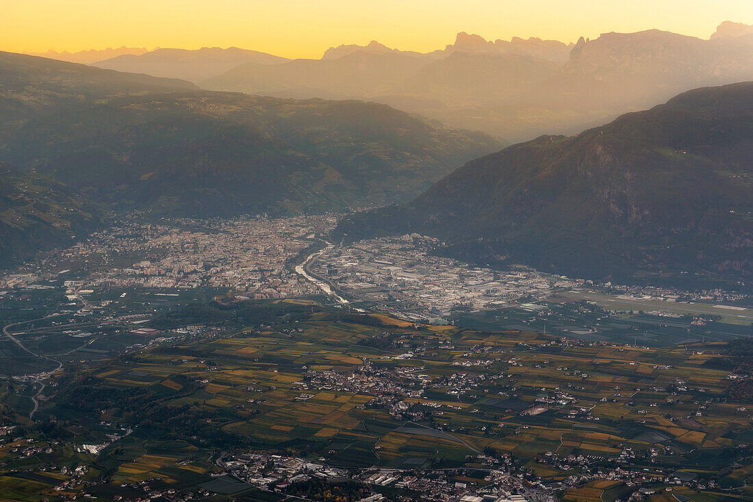 Sunrise on Bolzano city view from mount Penegal, Bolzano/Bozen, province of Bolzano, South Tyrol, Italy, Europe.