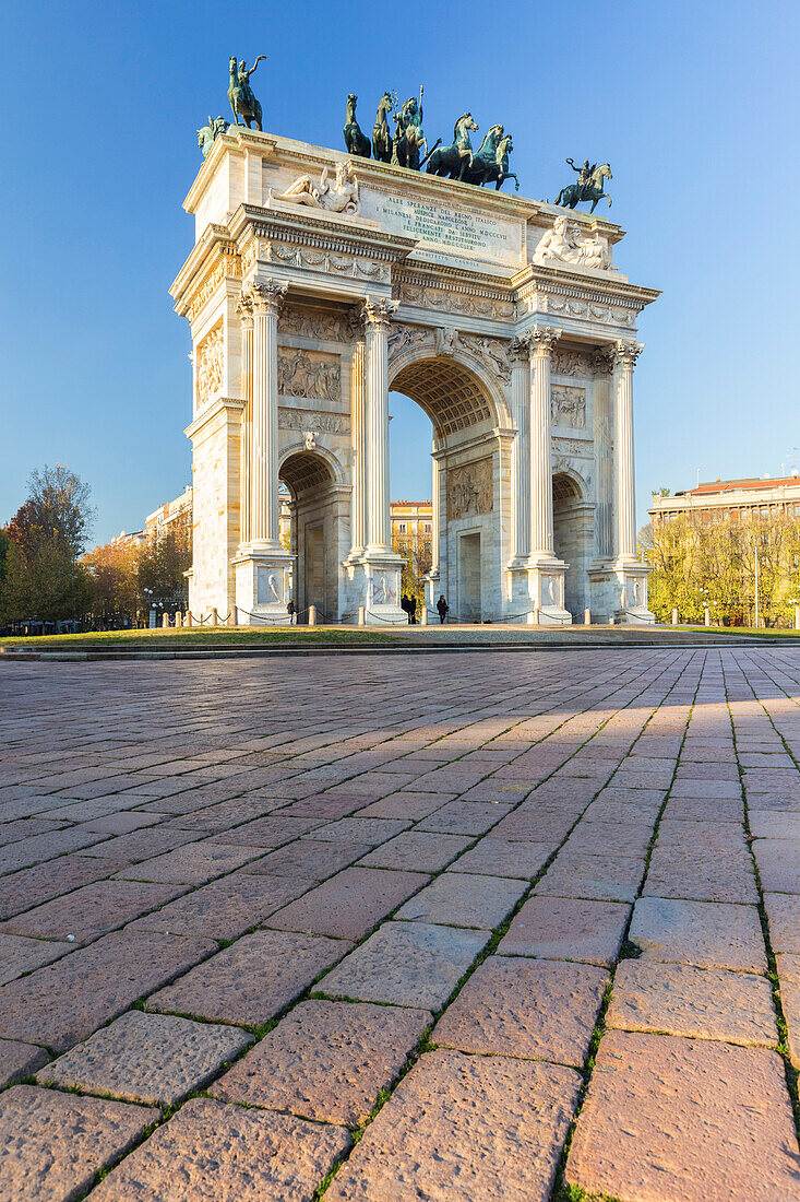 View of the Arco della Pace monument in Piazza Sempione. Milan, Lombardy, Italy.