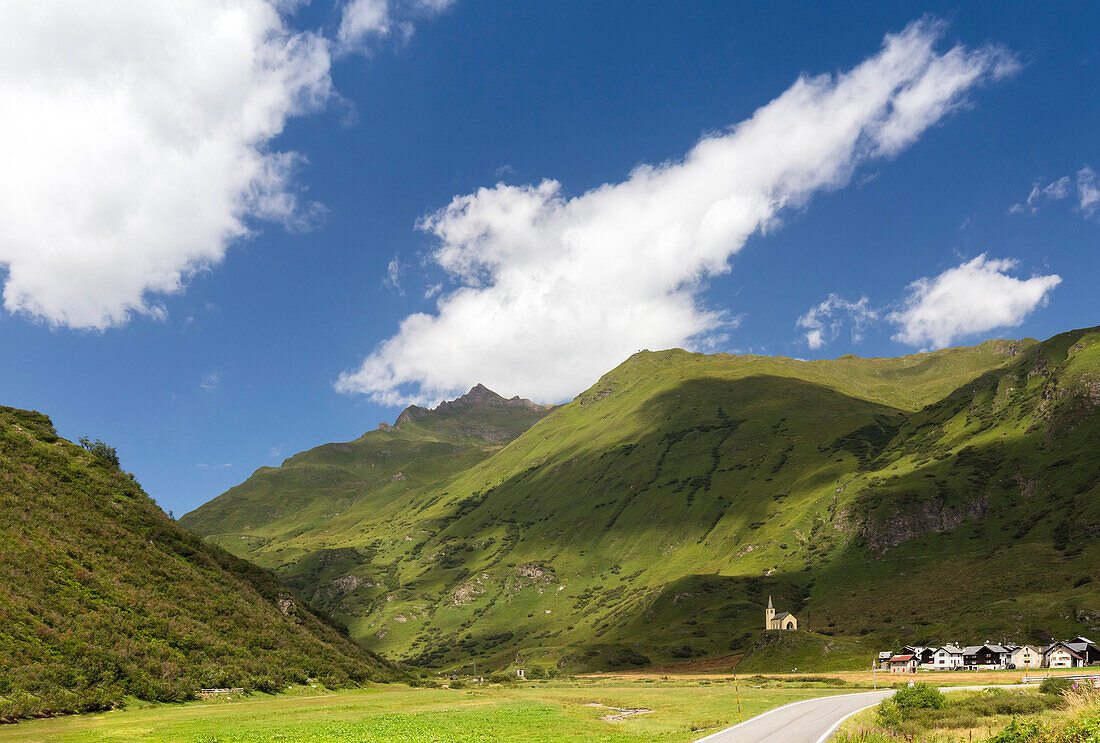 View of the church and town of Riale in summer. Formazza, Valle Formazza, Verbano Cusio Ossola, Piedmont, Italy.