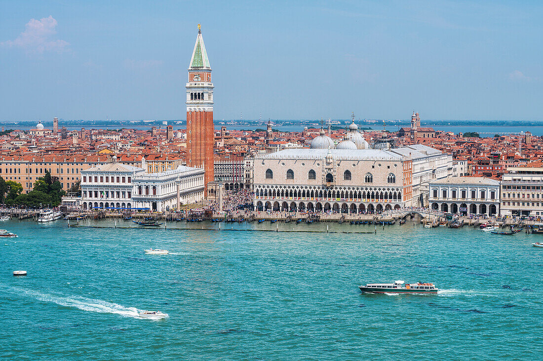 Classic view of Doge's Palace and bell tower of St. Mark from the bell tower of St. George's island, Venice, Veneto, Italy