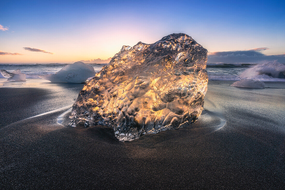 Jokulsarlon, East Iceland, Iceland. Ice formations on the beach at sunrise.