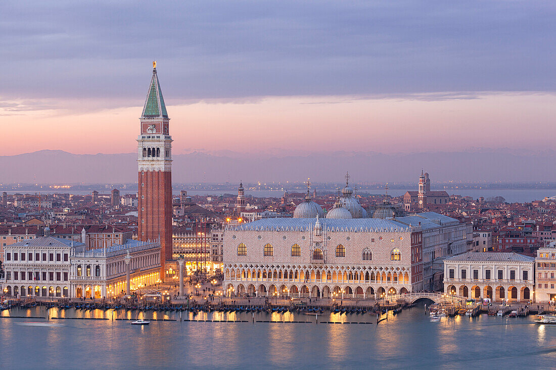 View of San Marco Square from the bell tower of abbey of San Giorgio Maggiore at dusk, Venice, Veneto, Italy