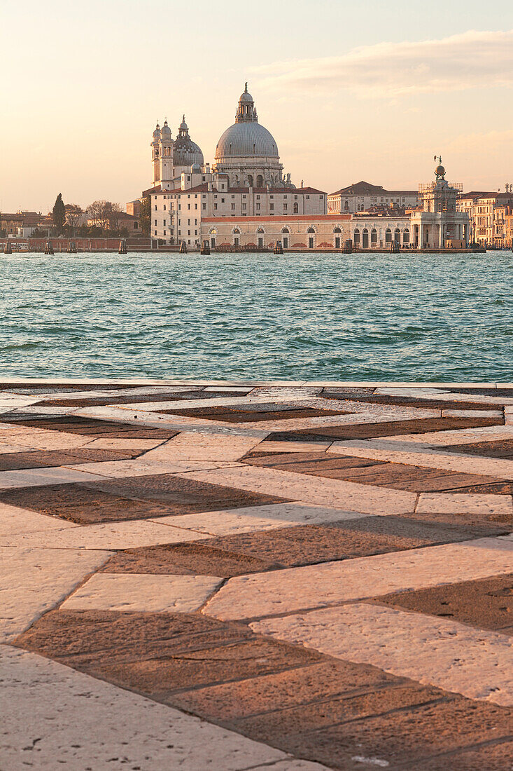 View of Punta della Dogana with church of Santa Maria della Salute from San Giorgio Maggiore island, Venice, Veneto, Italy