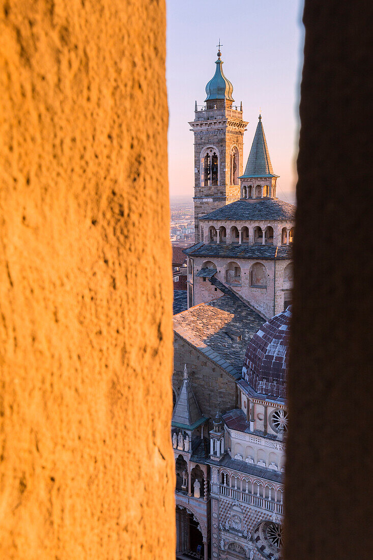 Basilica of Santa Maria Maggiore from a breach in the Civic Tower during sunset. Bergamo(Upper town), Lombardy, Italy.
