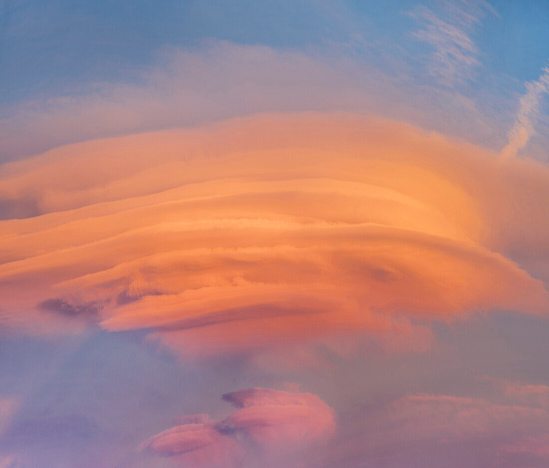 Lenticular clouds at sunset, North America