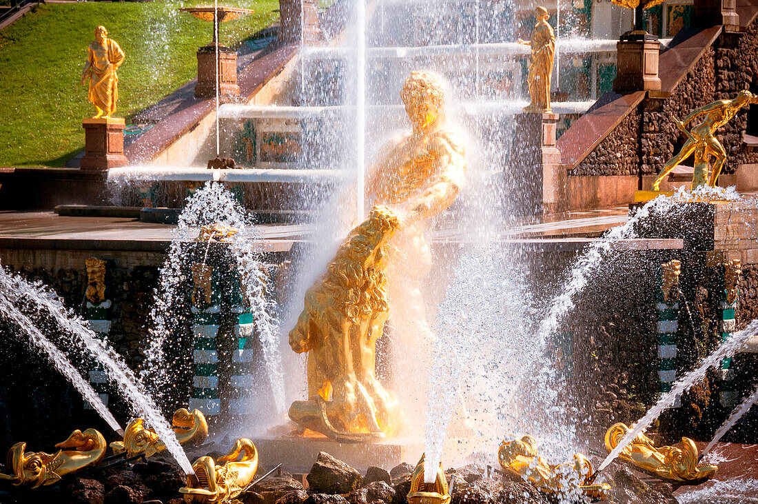 Golden statues of the fountain Grand Cascade of Peterhof, Saint Petersburg, Russia