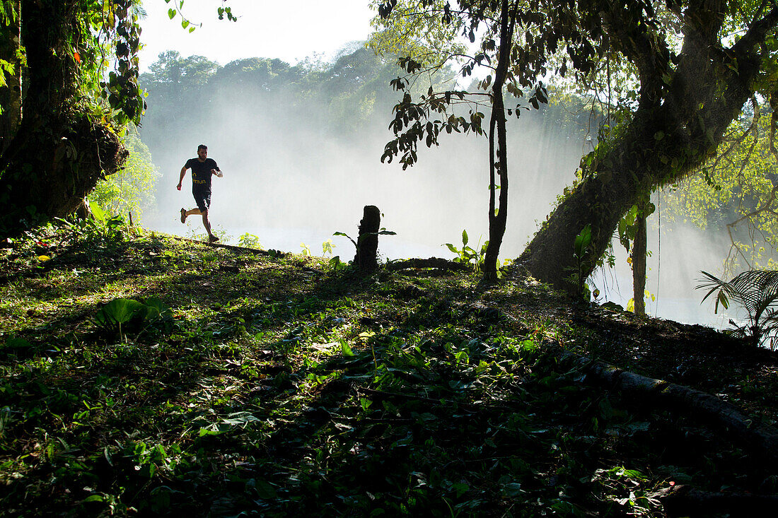 Marcos Ferro runs down the lower section of  Agua Azul waterfalls in Chiapas, M??xico