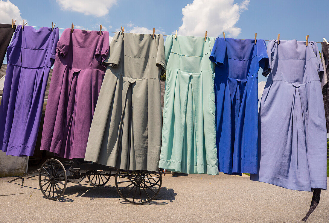 Traditional Amish dresses hanging on clothesline, Intercourse, Pennsylvania, USA