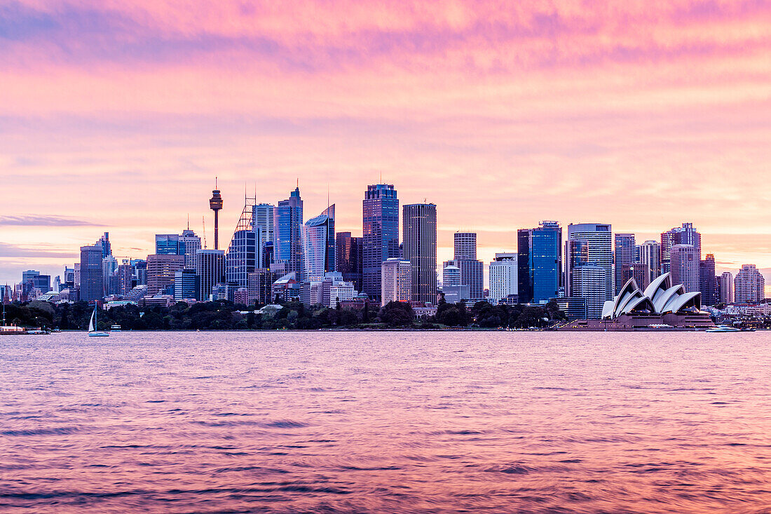 Sydney skyline and Opera House at sunset. New South Whales, Australia