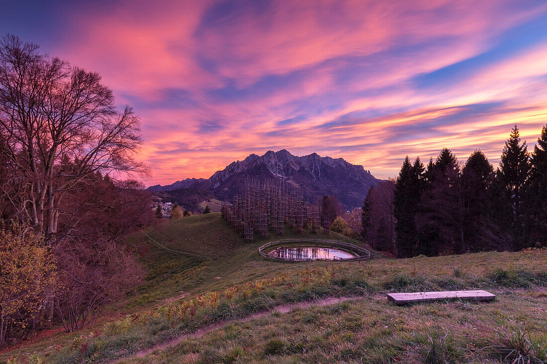 Autumnal sunset at the Cattedrale Vegetale monument at Plassa hamlet, Oltre il Colle, Val Serina, Bergamo district, Lombardy, Italy.