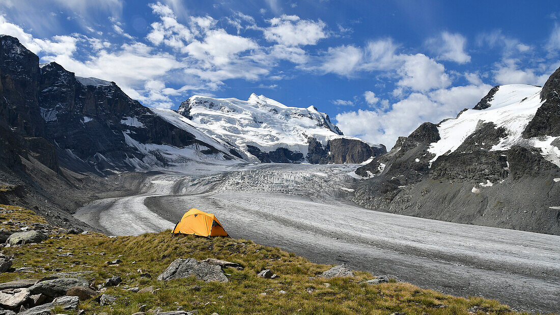 Camping on the ridge of moraine, close to the Grand Combin glacier, Grand Combin on background,Switzerland,Swiss