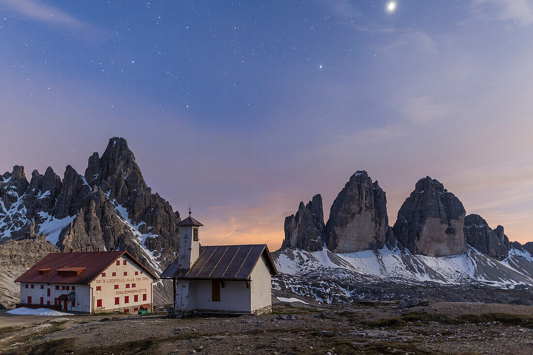 Starry sky on Locatelli Refuge and Tre Cime Di Lavaredo (Drei Zinnen), Sexten Dolomites, South Tyrol, Italy