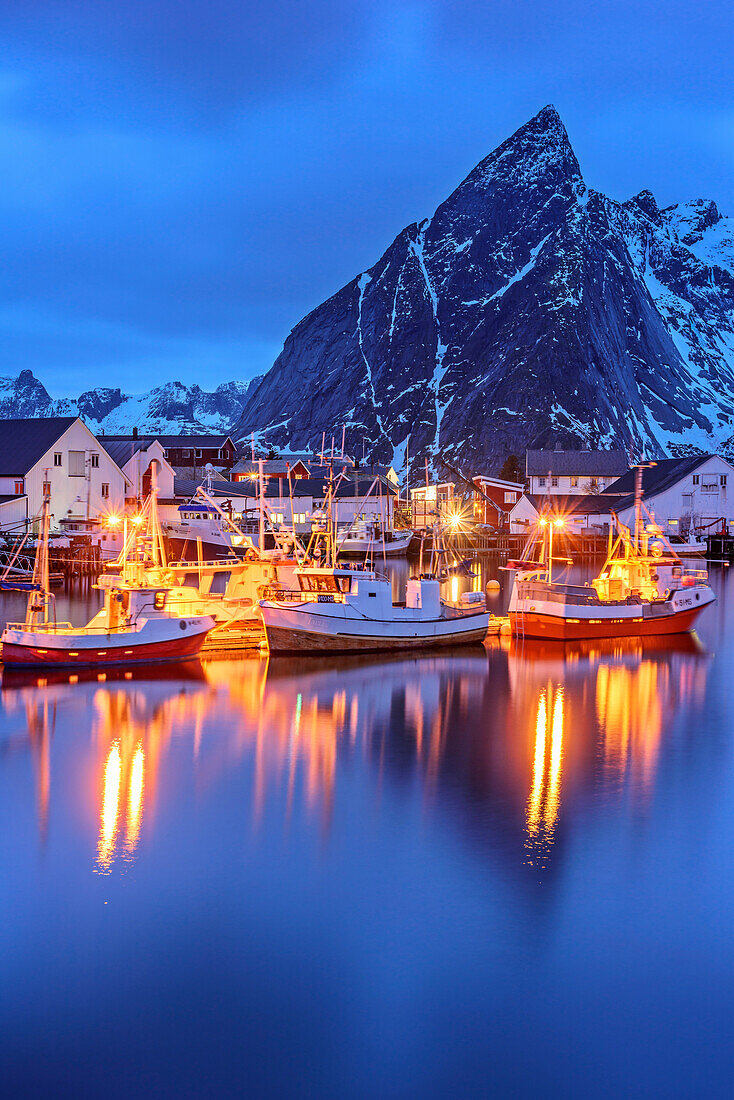 Harbour and fisherman´s cabins in Hamnoy at dusk, Lofoten, Nordland, Norway