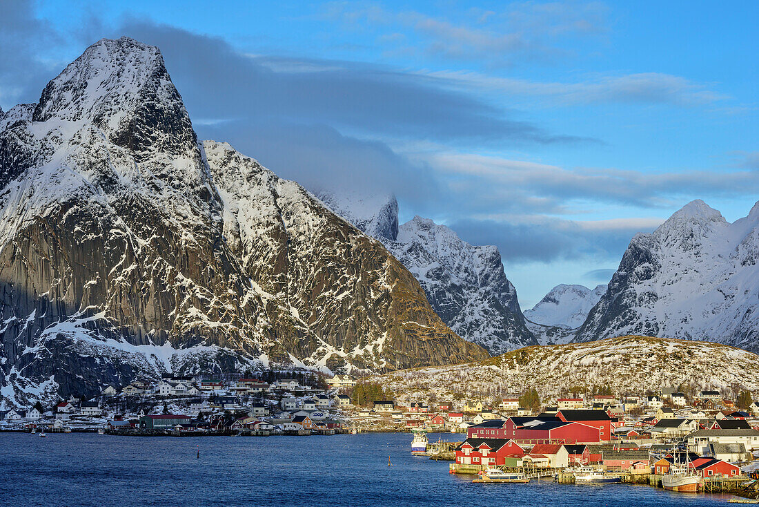Fisherman´s cabins of Reine with mountains in background, Reine, Lofoten, Nordland, Norway