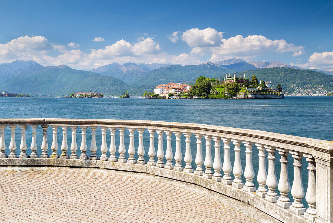 View of the Borromean Islands, Isola dei Pescatori and Isola Bella from a balcony on the lake front of Stresa in a spring day. Verbano Cusio Ossola, Lago Maggiore, Piedmont, Italy.