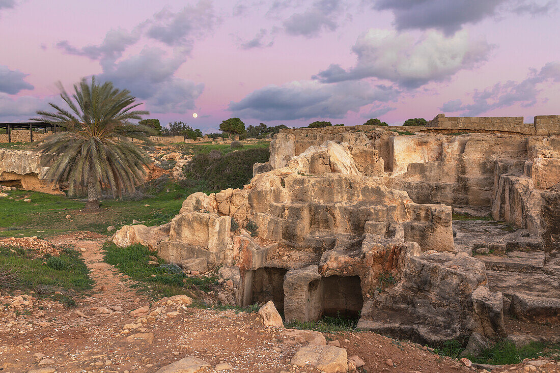 Cyprus, Paphos, view of the Tombs of the Kings at the dusk with full moon