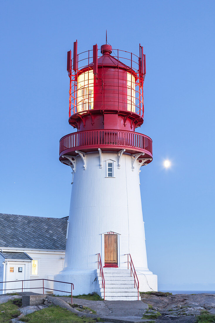 Moon above lighthouse Lindesnes fyr at the Cape Lidesnes, Skagerak, Northern Sea, Vest-Agder, Sorlandet, Southern Norway, Norway, Scandinavia, Northern Europe, Europe