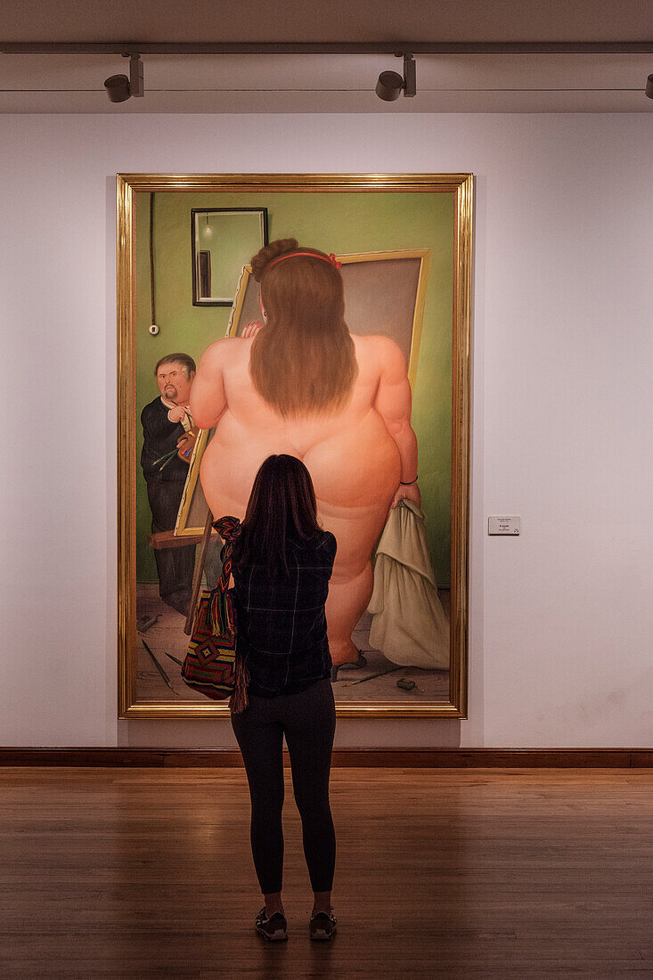 woman gazes at nude painting of fat lady, Botero Museum (Museo Botero), capital Bogota, Departmento Cundinamarca, Colombia, Southamerica