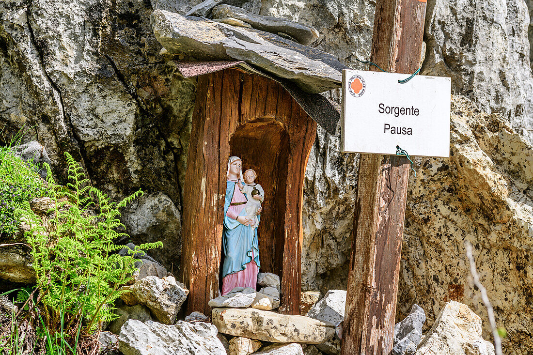 Statue of Holy Mary at fountain Sorgente Pausa, Val Maira, Cottian Alps, Piedmont, Italy