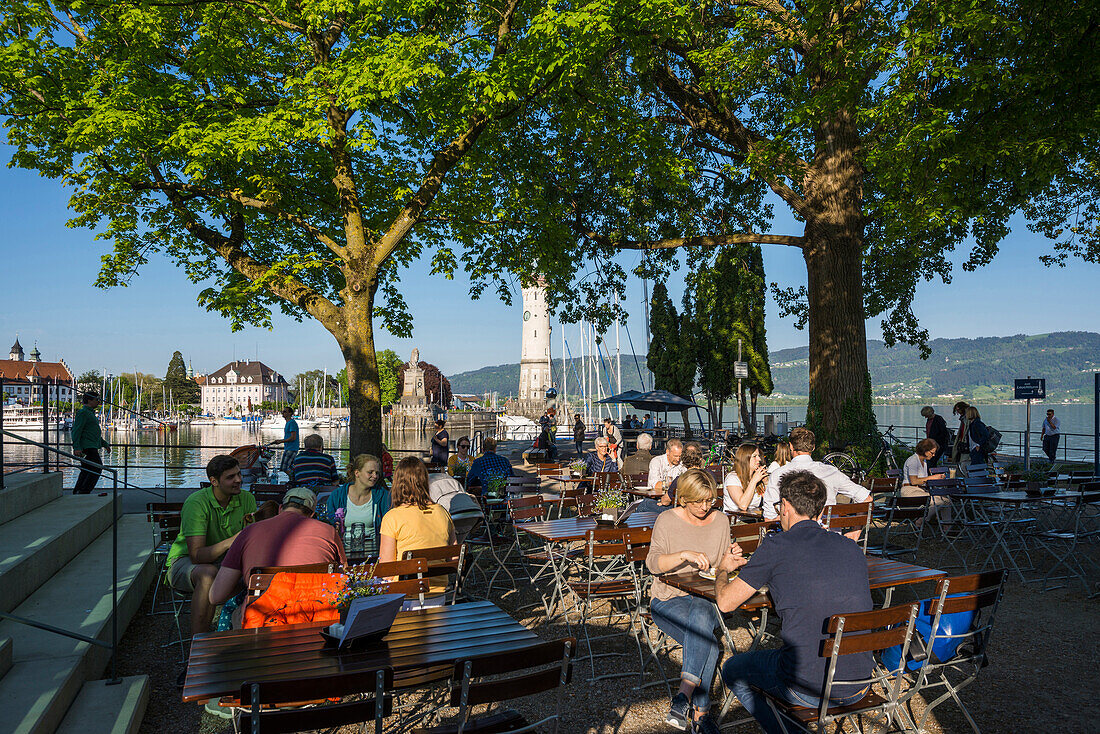 Beer garden at the harbor, Lindau, Lake Constance, Bavaria, Germany