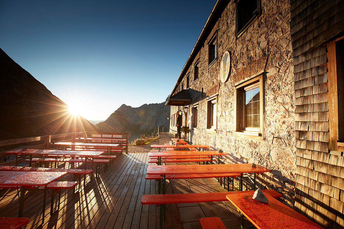 morning light on terrace of Lamsenjoch apine hut,  Eastern Karwendel Range, Tyrol, Austria