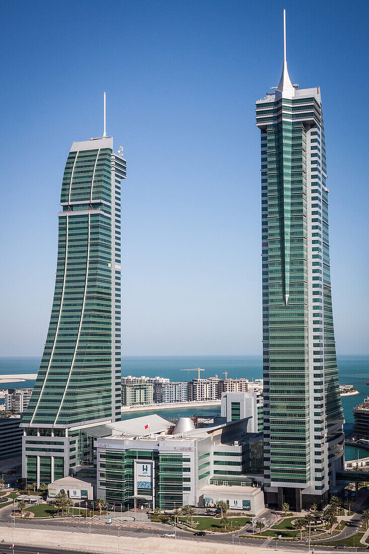 general shot of the glass towers of the bahrain financial harbour in the city center of manama, kingdom of bahrain, persian gulf, middle east