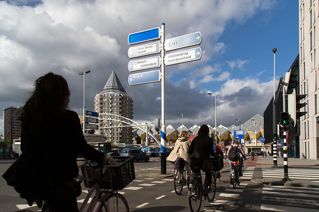 cycling path in front of the cubic houses kubuswoningen, stayokay youth hostel, blaak train station, rotterdam city center, the netherlands