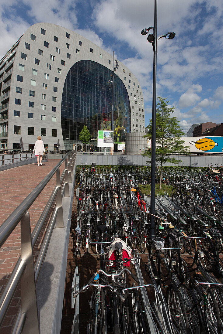 bicycle parking in front of the markthal rotterdam, covered market, gastronomic stroll, artistic curiosity, city center, rotterdam, holland, the netherlands.