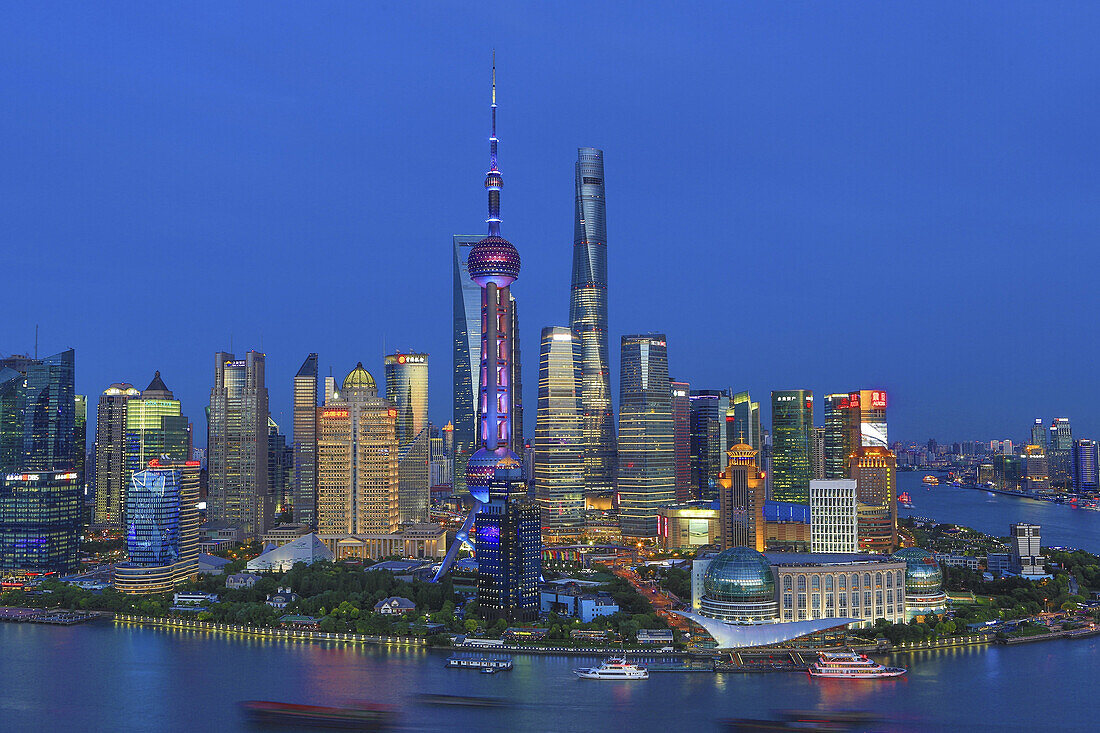 China, Shanghai City, Pudong Skyline,Oriental Pearl, World Financial Center and Shanghai Towers, Huangpu River.