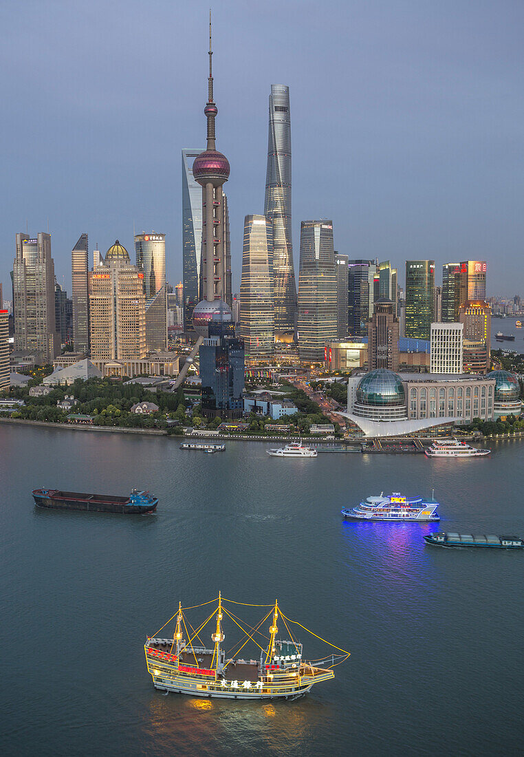 China, Shanghai City, Pudong Skyline,Oriental Pearl, World Financial Center and Shanghai Towers, Huangpu River.