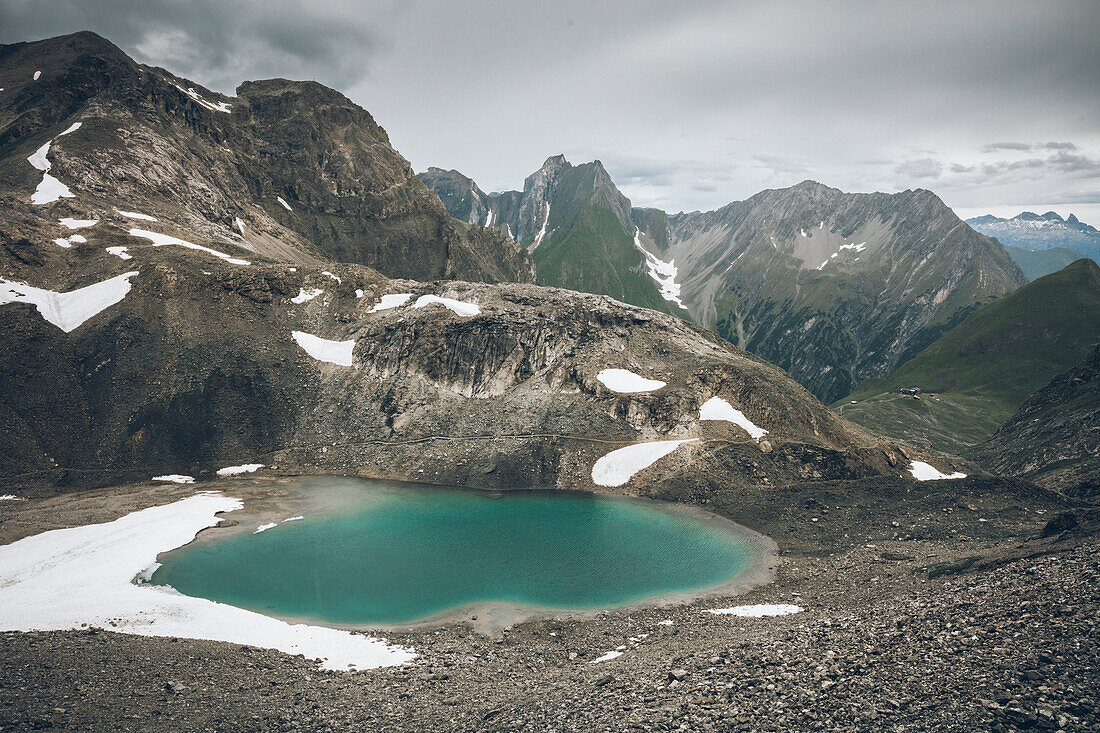 Mountain lake at the Seescharte, E5, Alpenüberquerung, 3rd stage, Seescharte,Inntal, Memminger Hütte to  Unterloch Alm, tyrol, austria, Alps