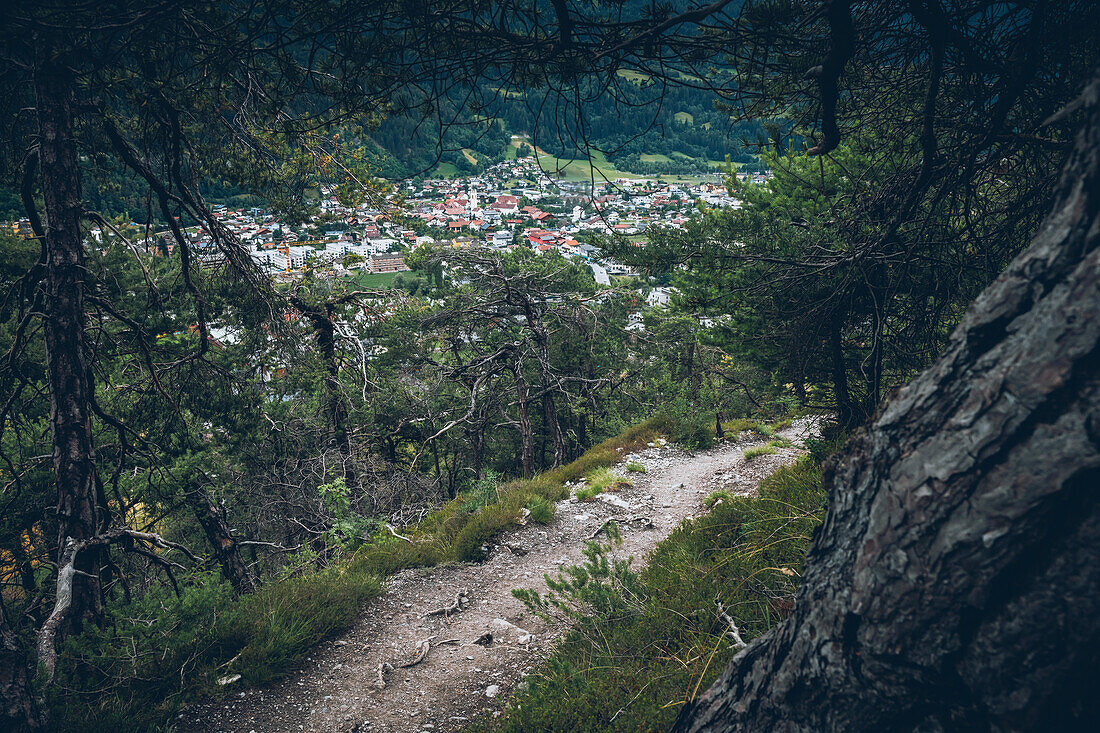 Long-distance hiking trail with a view to Landeck, E5, Alpenüberquerung, 3rd stage, Seescharte,Inntal, Memminger Hütte to  Unterloch Alm, tyrol, austria, Alps