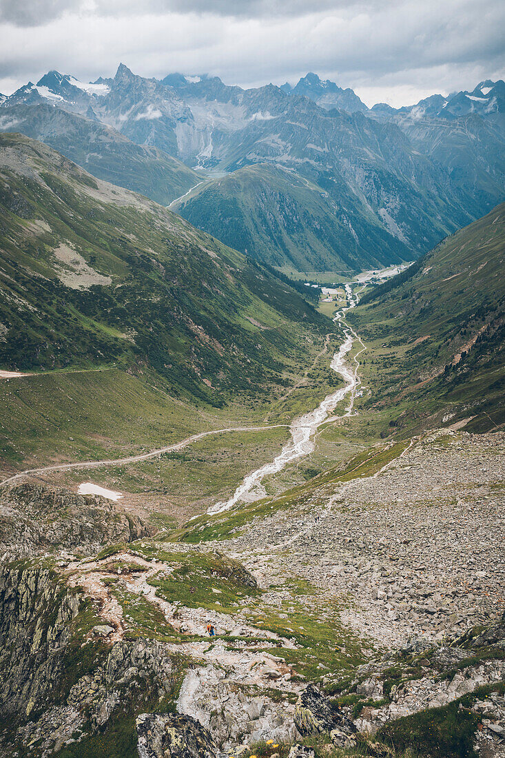 Wanderin on the ascent on the long distance hiking trai, E5, Alpenüberquerung, 4th stage, Skihütte Zams,Pitztal,Lacheralm, Wenns, Gletscherstube, Zams to  Braunschweiger Hütte, tyrol, austria, Alps