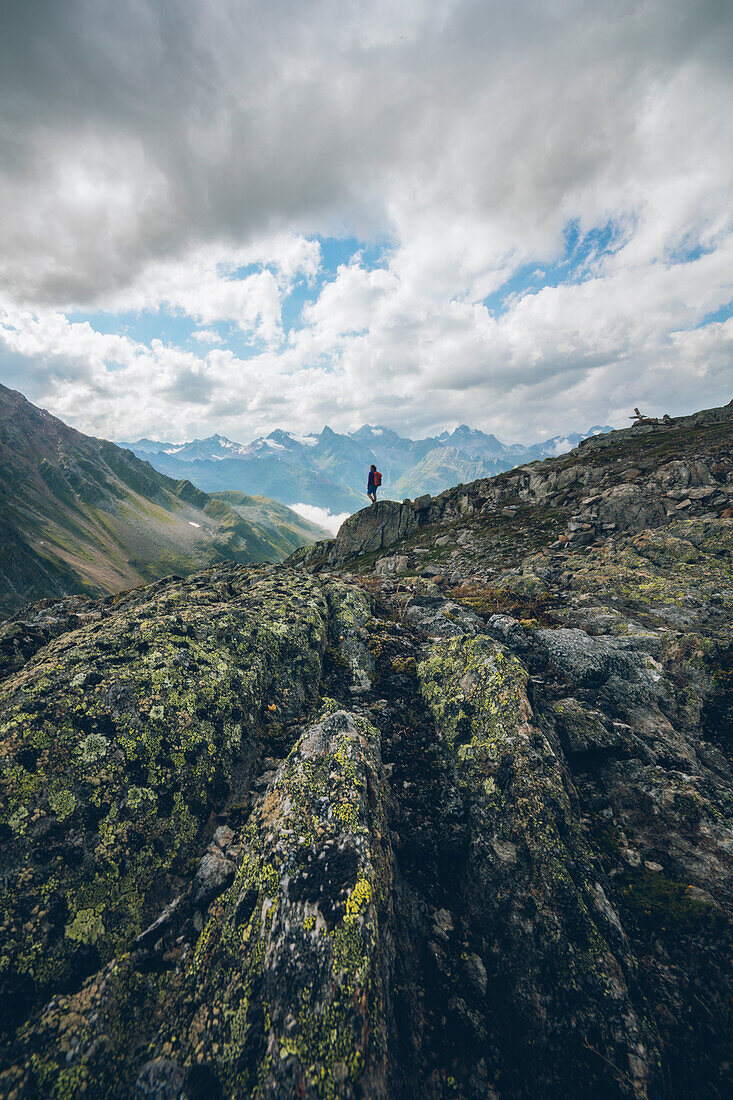 Climber enjoys view in the Pitztal, E5, Alpenüberquerung, 4th stage, Skihütte Zams,Pitztal,Lacheralm, Wenns, Gletscherstube, Zams to  Braunschweiger Hütte, tyrol, austria, Alps