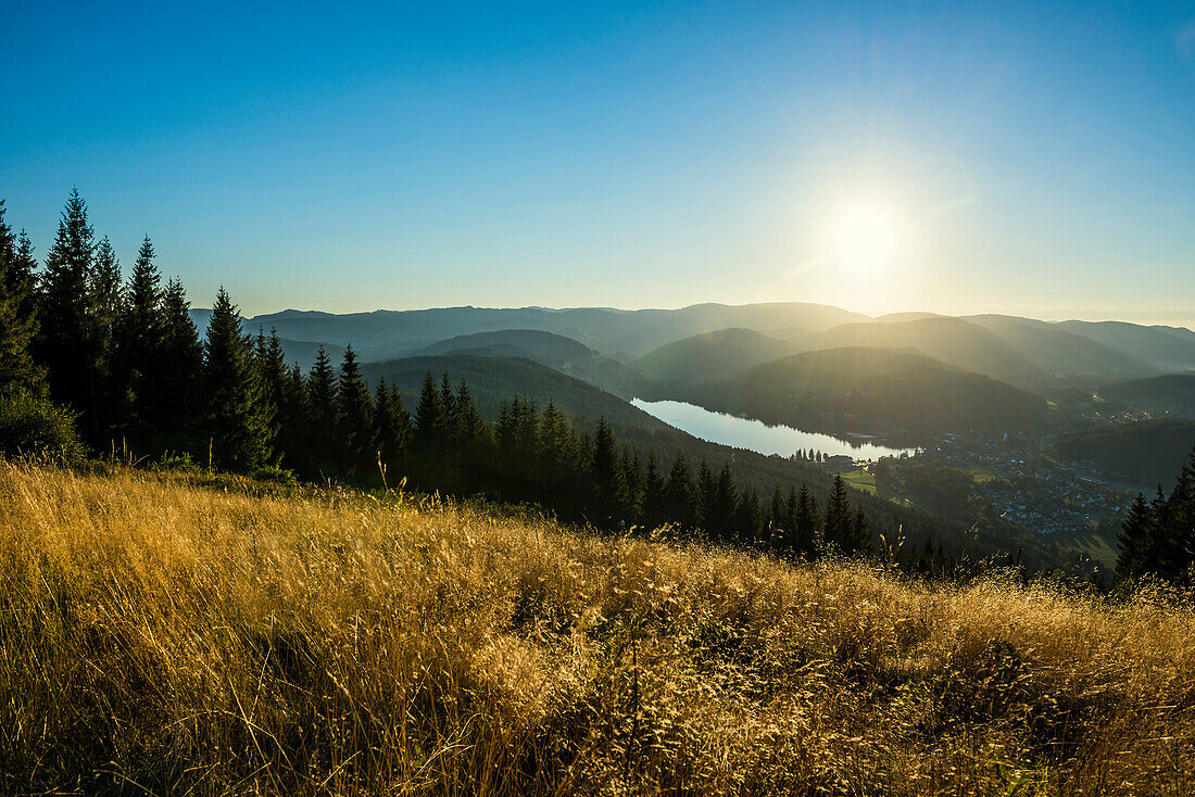 View from Hochfirst to Lake Titisee and Feldberg mountain at sunset, Neustadt, Black Forest, Baden-Württemberg, Germany