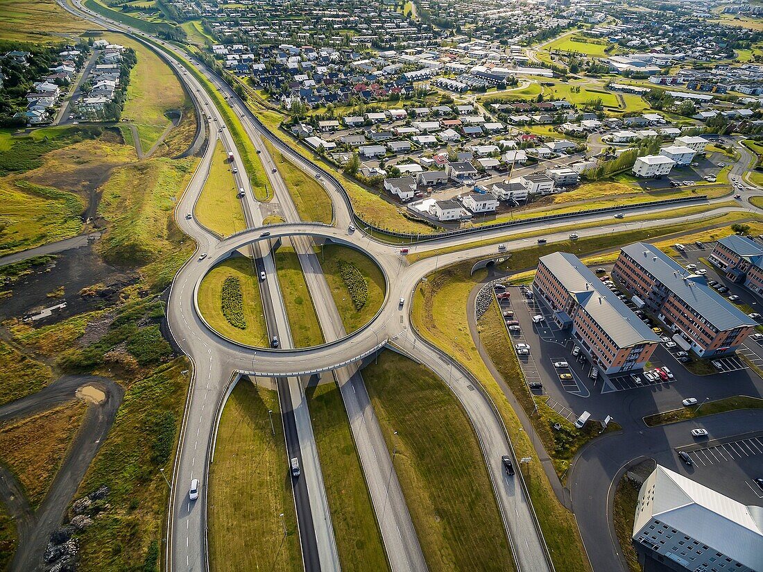 Aerial view of traffic circle and roads, Reykjavik area, Iceland.