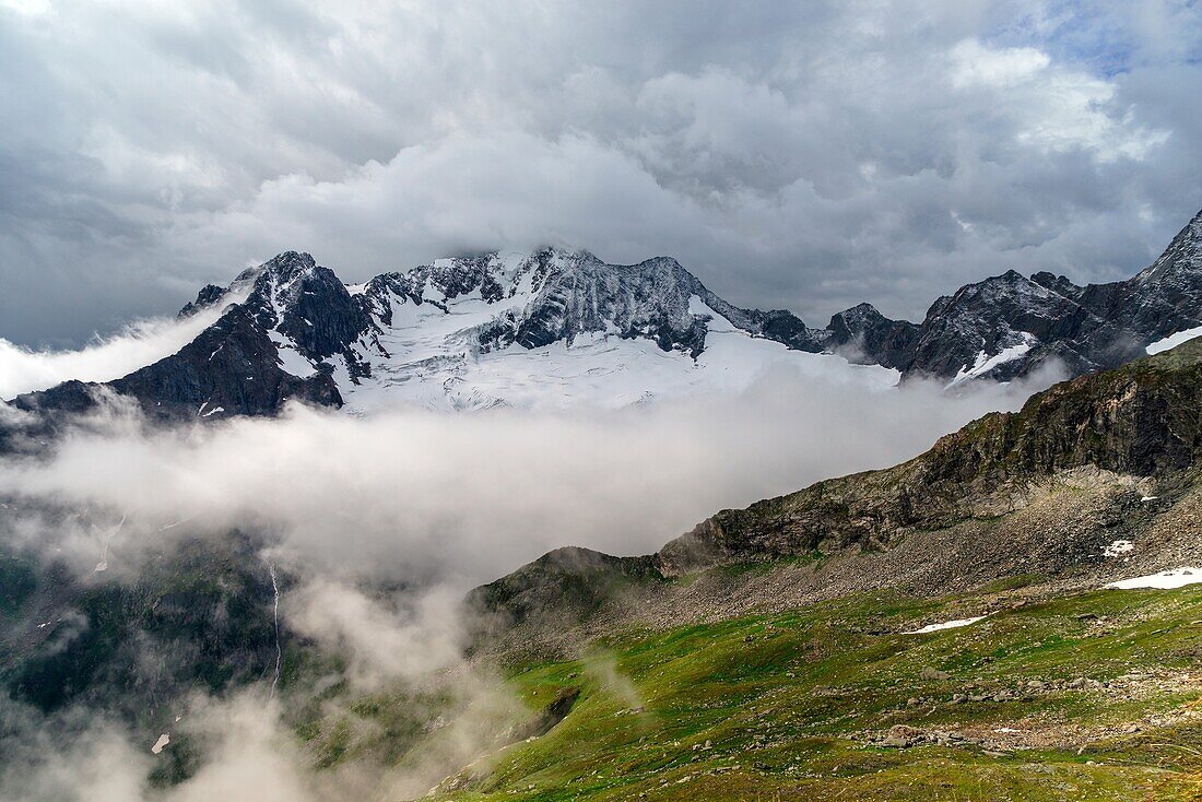 Clouds around Mount Disgrazia, Chiareggio, Valmalenco, Province of Sondrio, Lombardy, Italy.