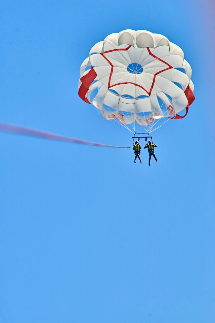 Couple during parasailing. Chersonissos. Crete, Greece.